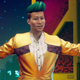A newscaster looks excited in Cyberpunk 2077.